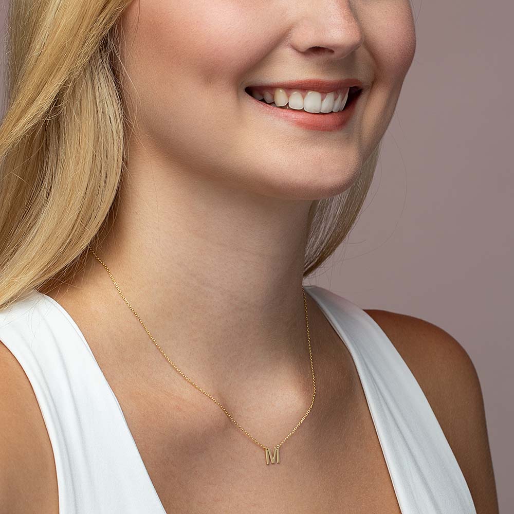 Model with Necklace and M Pendant